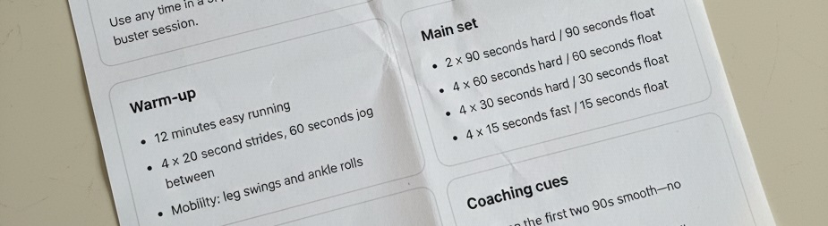 Group of runners training on a track